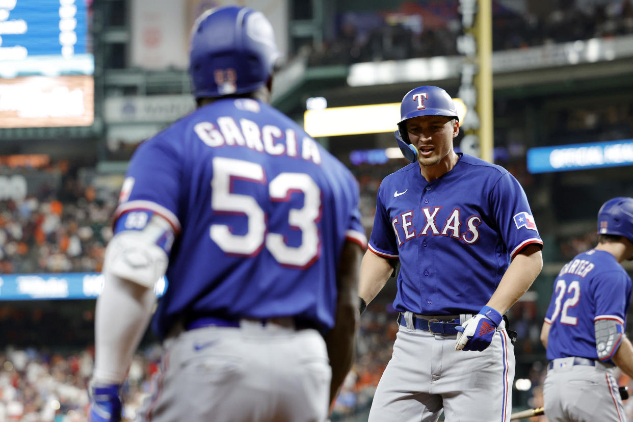 Corey Seager and Adolis García have powered Texas all month. (Carmen Mandato/Getty Images)