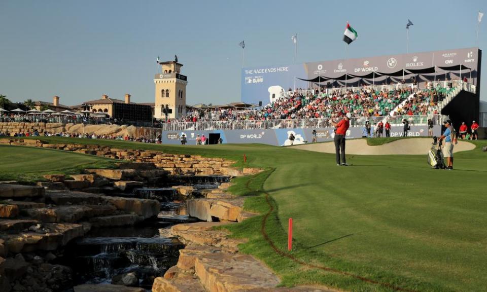 Justin Rose of England plays his fourth shot on the 18th during the third round of the DP World Tour Championship, on the Earth Course in Dubai