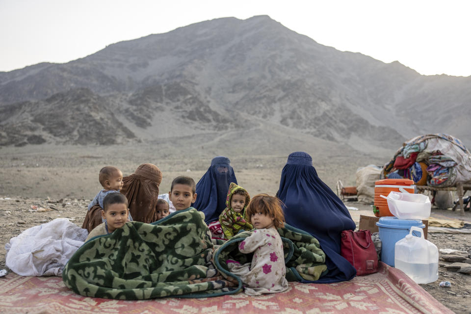 Afghan refugees settle in a camp near the Torkham Pakistan-Afghanistan border, in Torkham Afghanistan, Saturday, Nov. 4, 2023. A huge number of Afghans refugees entered the Torkham border to return home hours before the expiration of a Pakistani government deadline for those who are in the country illegally to leave or face deportation. (AP Photo/Ebrahim Noroozi)