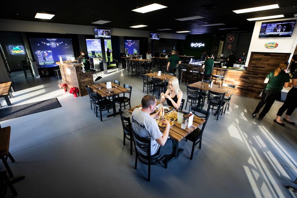 The Back Nine, a restaurant/bar/golf simulator, is expanding into downtown Lakeland.