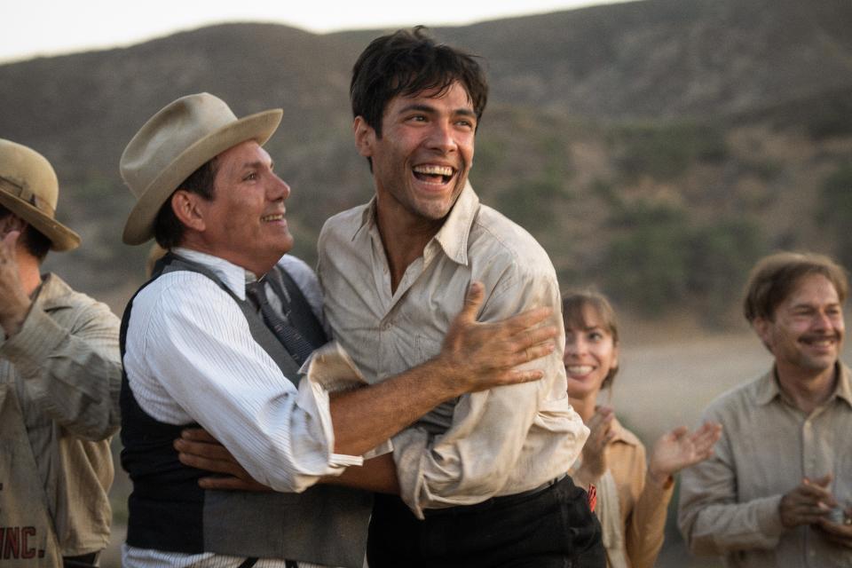 Manny (Diego Calva, center, with Lukas Haas) finds happiness on a movie set in the 1920 Hollywood ode "Babylon."