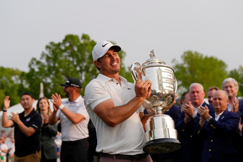 Brooks Koepka hoists the Wanamaker Trophy after winning the 2023 PGA Championship at Oak Hill Country Club. (Photo: Adam Cairns-USA TODAY Sports)