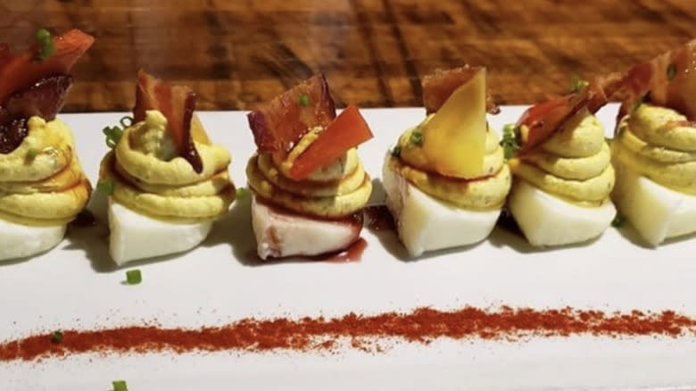 Deviled eggs with candied bacon