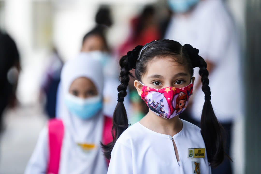 Sekolah Kebangsaan Methodist Perempuan students on their first day back at school in George Town July 22, 2020. — Picture by Sayuti Zainudin