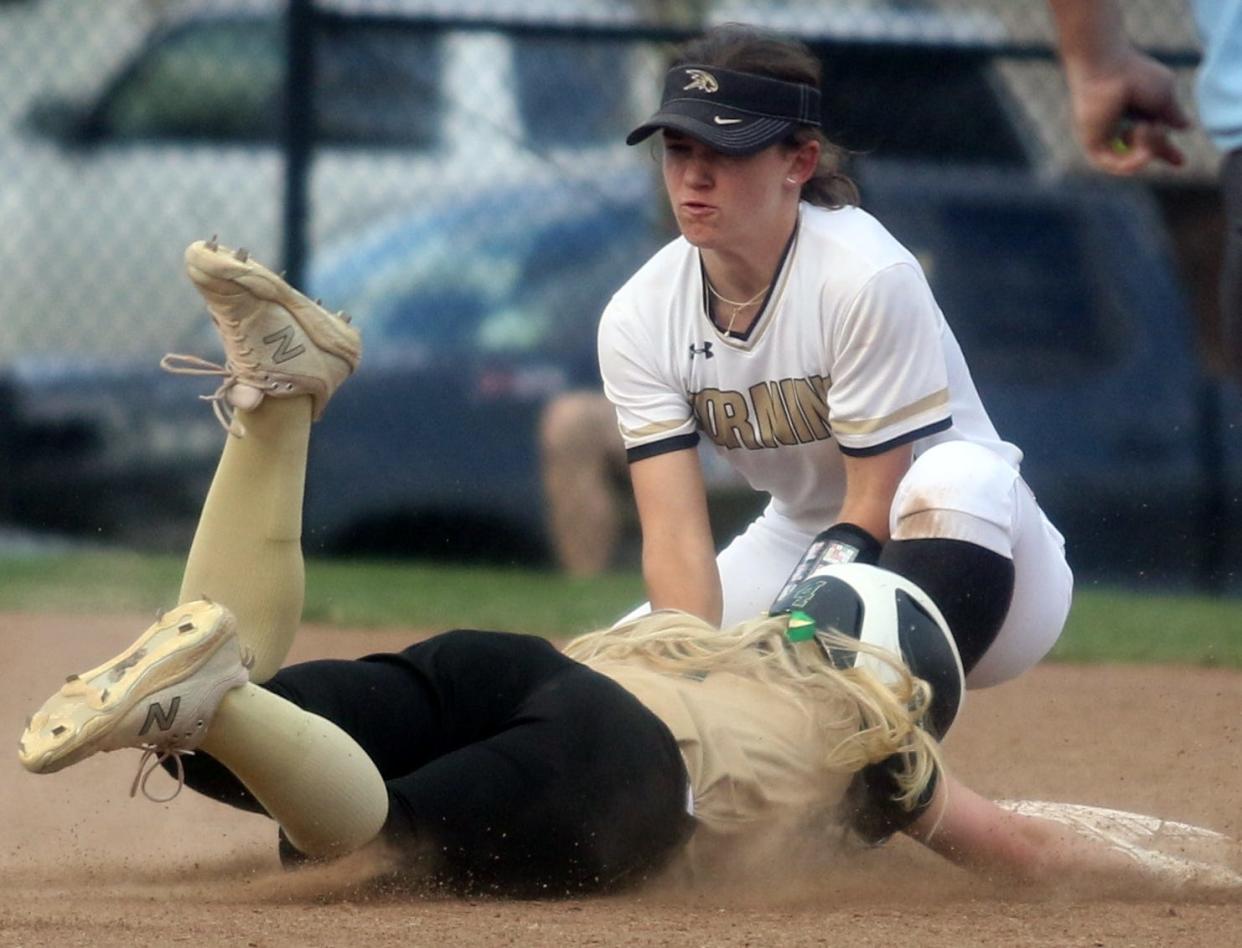 Corning shortstop Kendall Curreri tags out Vestal's Edna Kiefer at second base during the Golden Bears' 9-5 win last season.