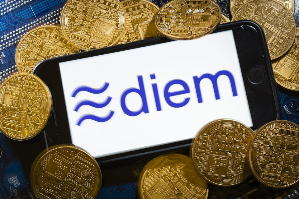 BERLIN, GERMANY - DECEMBER 07: The logo of the crypto currency Diem (formerly Libra) is displayed on a smartphone on December 07, 2020 in Berlin, Germany. (Photo by Thomas Trutschel/Photothek via Getty Images)