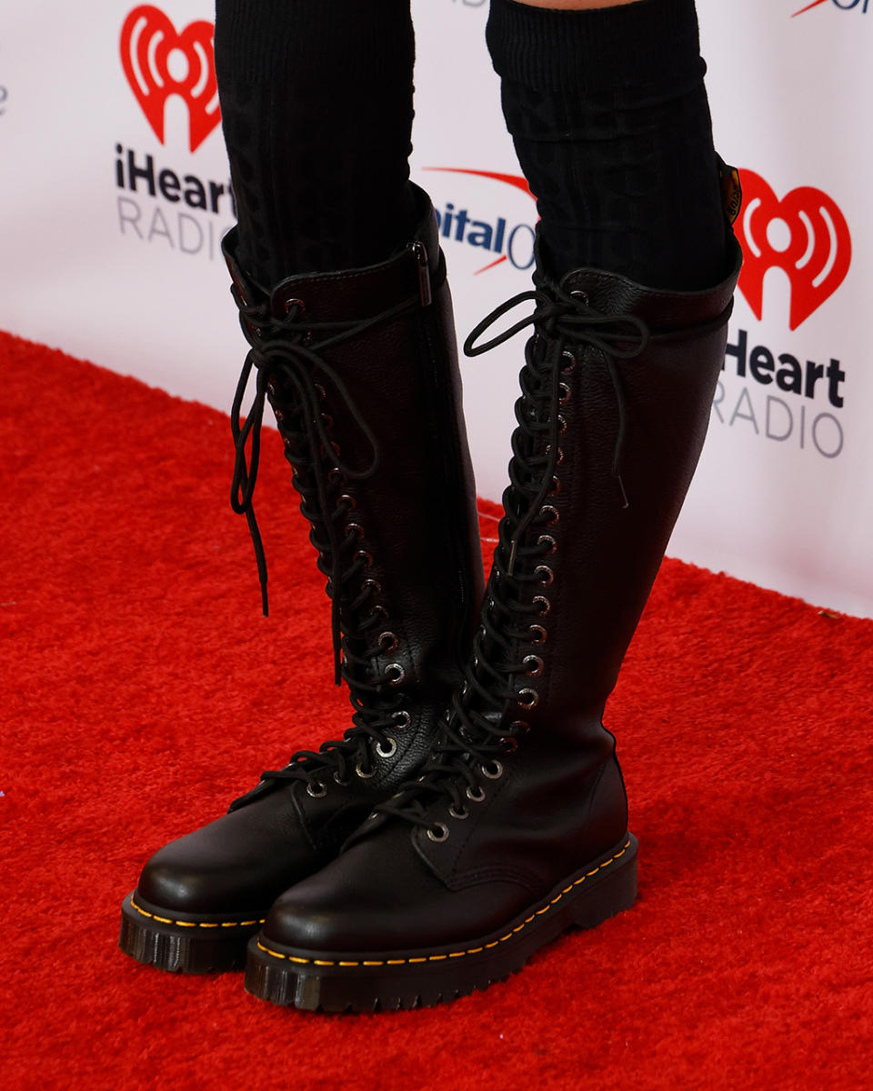 Olivia Rodrigo, Jingle Ball, Dr. Martens, boots, knee-high, Versace, grunge.