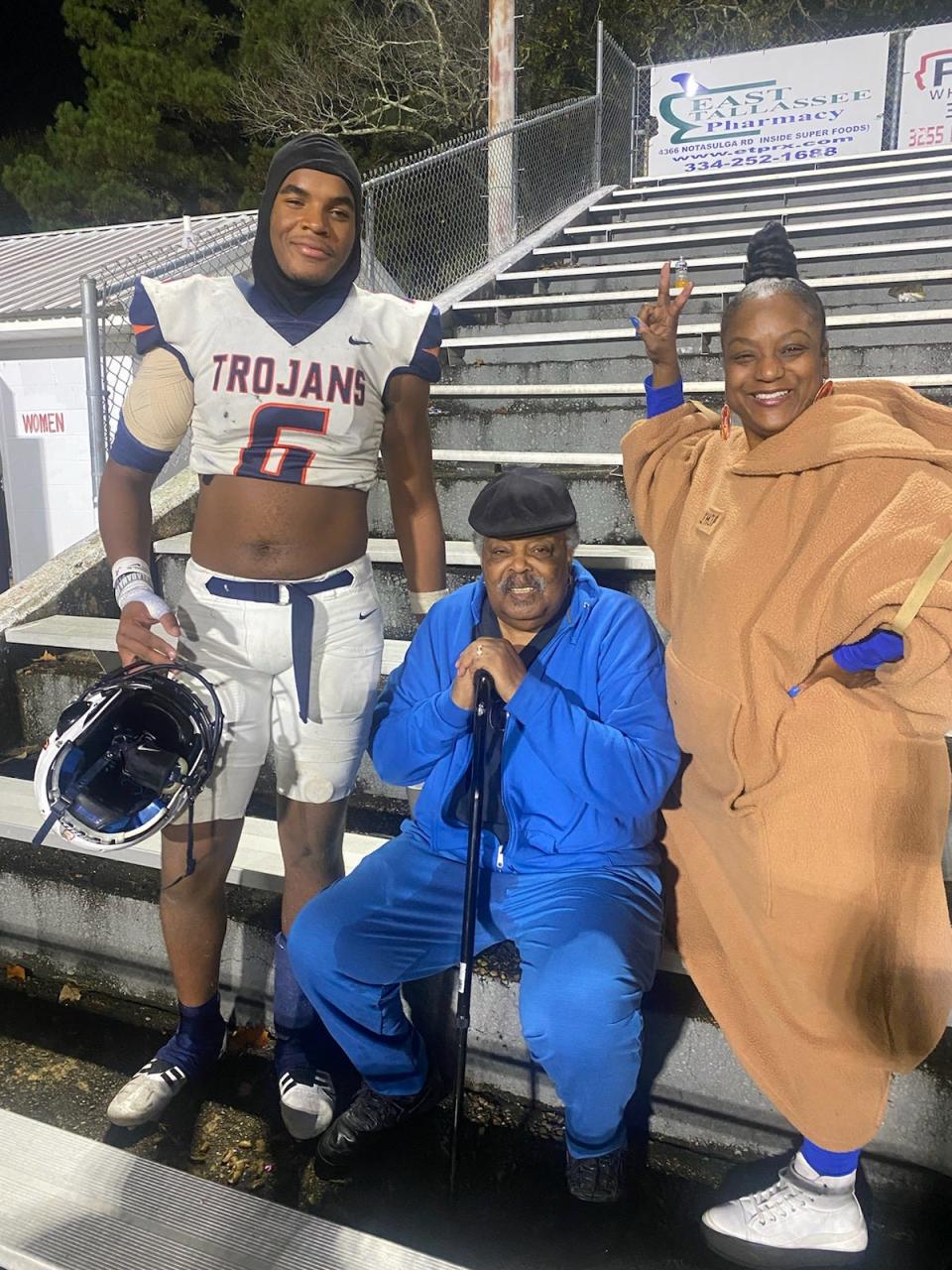 Zion Grady poses with his grandfather, Robert Grady, and aunt, Angel Massey, after Charles Henderson's 34-7 win over Tallassee. Robert and Angel drove in from Atlanta to watch Zion play.