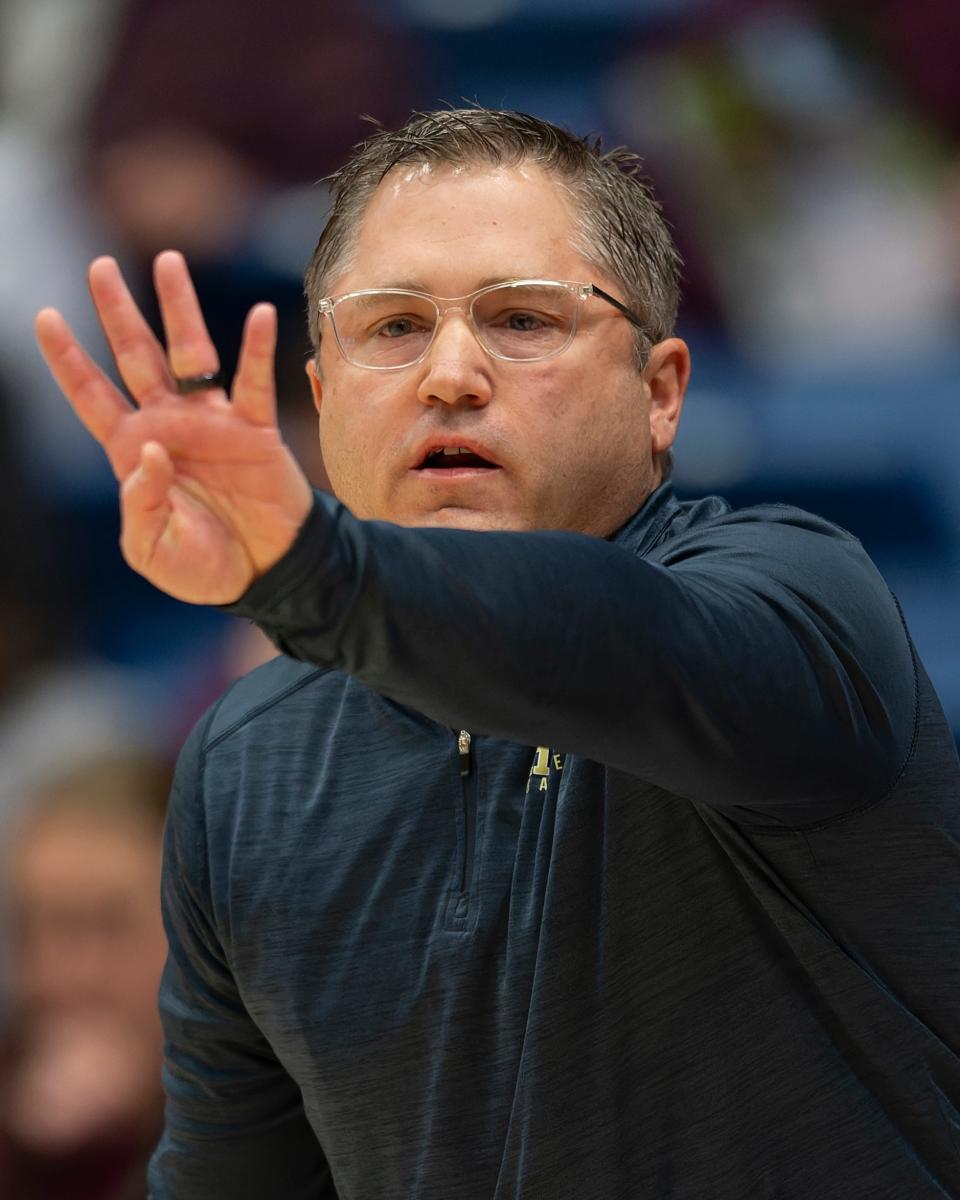 Hayden's head coach Carvel Reynoldson calls a play during State Basketball March. 8, 2024 at Hutchinson Sports Arena.