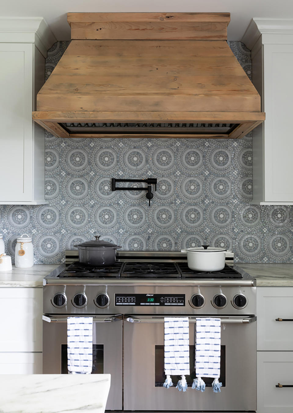 2. Play with texture to add character to your traditional white kitchen