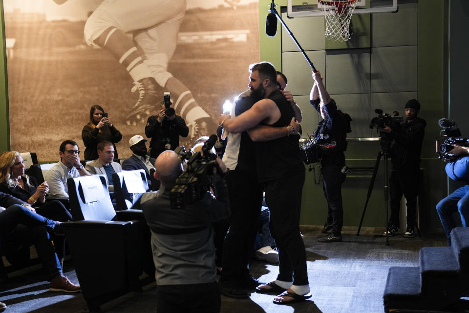 Philadelphia Eagles' Jason Kelce embraces his brother, Kansas City Chiefs' Travis Kelce, after an NFL football press conference announcing his retirement in Philadelphia, Monday, March 4, 2024. (AP Photo/Matt Rourke)