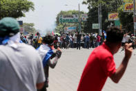 Demonstrators clash with supporters of Nicaraguan president Daniel Ortega's government in Managua, Nicaragua September 23, 2018. REUTERS/Oswaldo Rivas