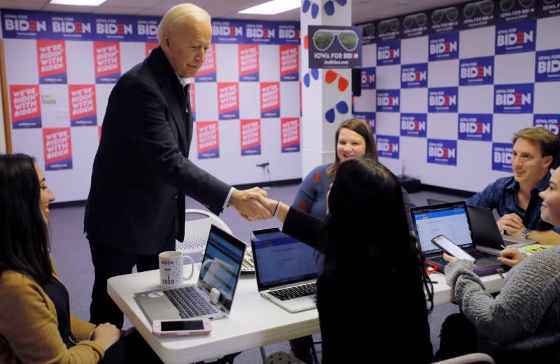 FILE PHOTO: Democratic 2020 U.S. presidential candidate Biden visits volunteers phone-banking in Des Moines