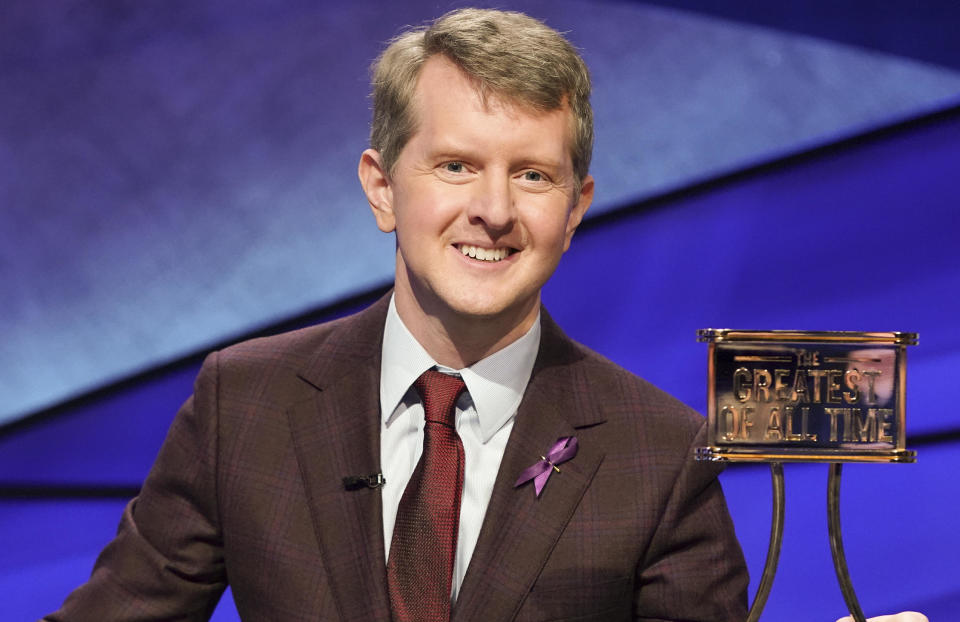 Ken Jennings with a trophy on 