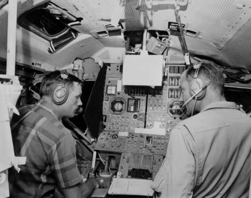 Picture from 1969 shows US astronauts Neil Armstrong (L) and Buzz Aldrin practicing in a simulator prior to their mission to the moon on Apollo XI. The first human to set foot on the moon, Armstrong has died following complications from cardiovascular surgery. He was 82