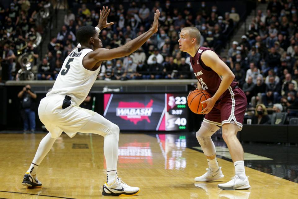 Purdue guard Brandon Newman (5) guards Bellarmine guard CJ Fleming (25) during the first half of an NCAA men's basketball game, Tuesday, Nov. 9, 2021 at Mackey Arena in West Lafayette.