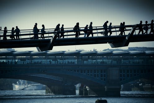 <span class="caption">A pre-pandemic London commute.</span> <span class="attribution"><a class="link " href="https://www.shutterstock.com/image-photo/london-commuters-230462692" rel="nofollow noopener" target="_blank" data-ylk="slk:Shutterstock/Lance Bellers;elm:context_link;itc:0;sec:content-canvas">Shutterstock/Lance Bellers</a></span>