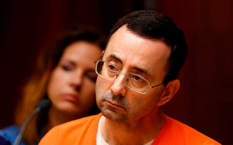 Former Michigan State University and USA Gymnastics doctor Larry Nassar during court proceedings - Credit:  JEFF KOWALSKY/AFP