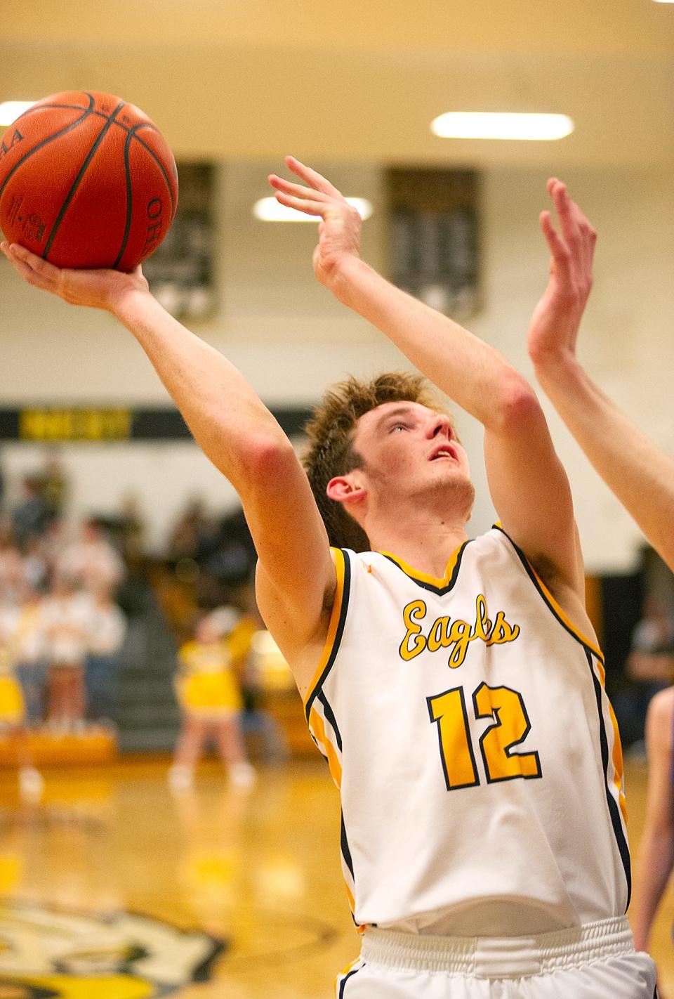 Colonel Crawford's Jacob Maddy shoots from the zone.