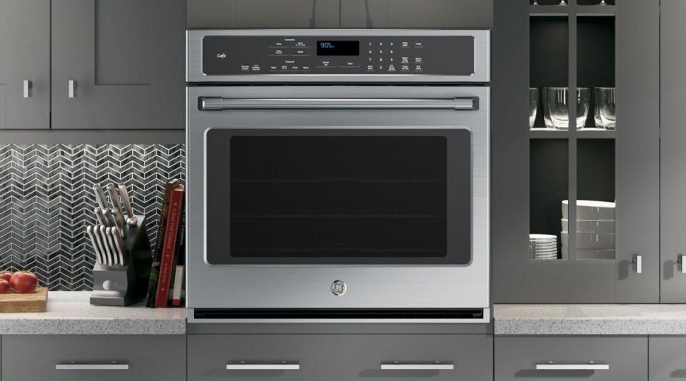 An oven refers specifically to the box that heats your food.