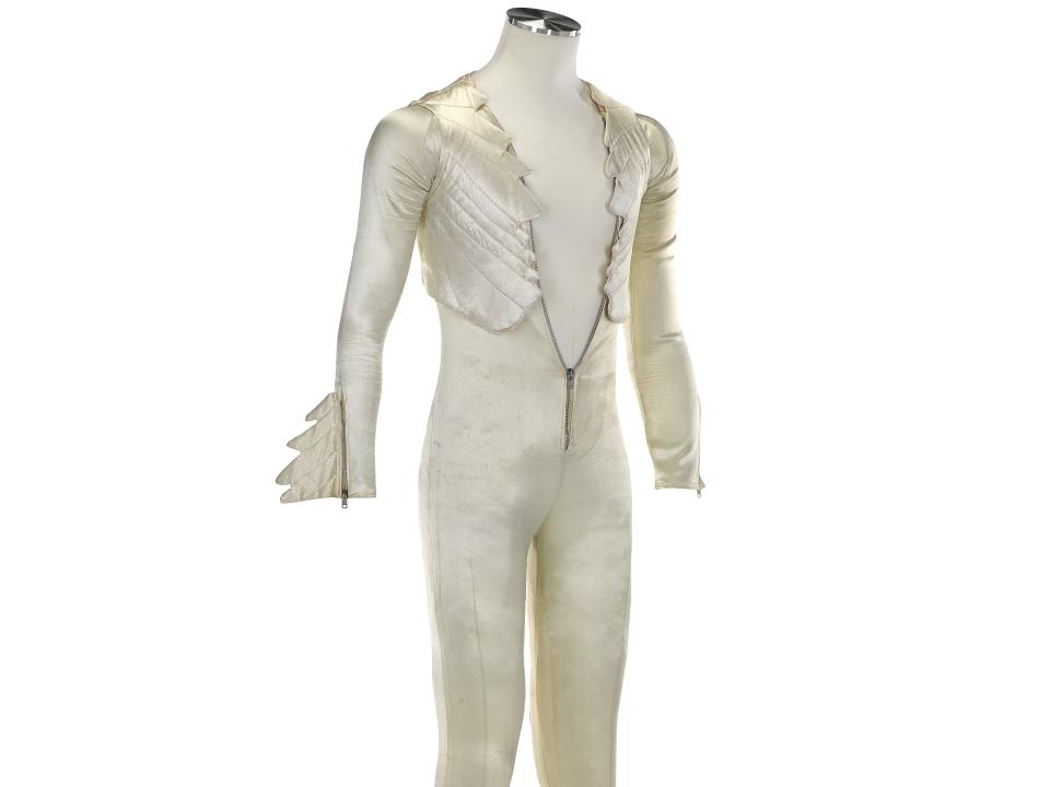 Freddie Merciry's ivory satin catsuit.