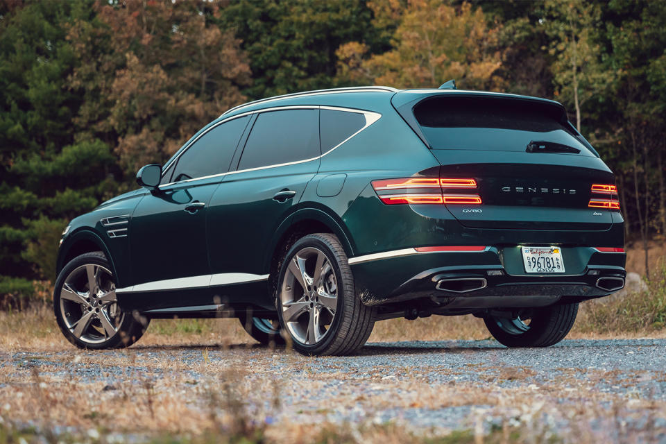 The back end of the 2021 Genesis GV80 SUV in green