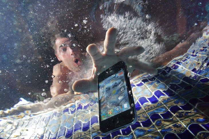 A man panics as he tries to figure out what to do if your phone falls in the pool