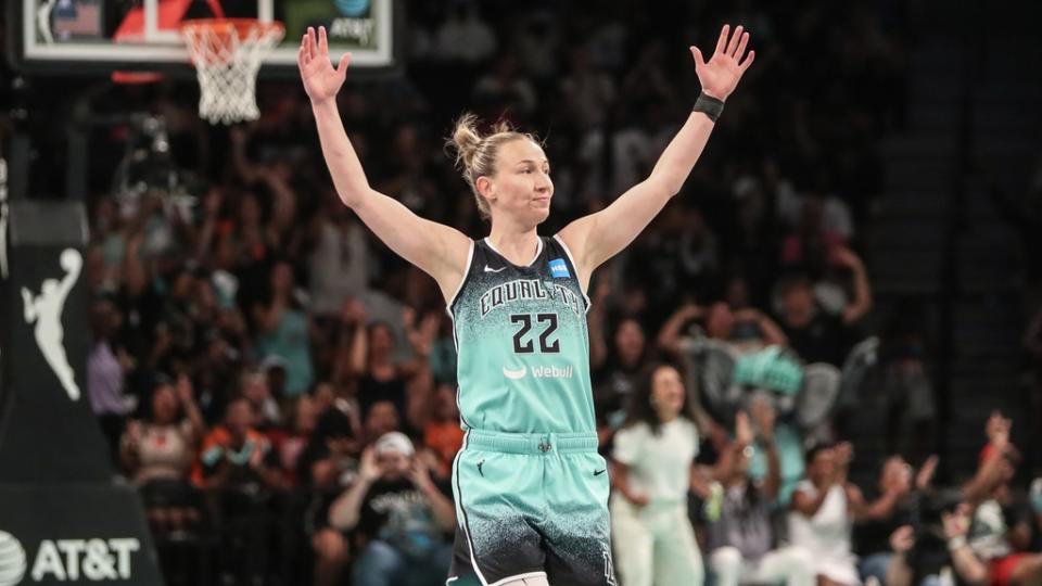 Aug 6, 2023; Brooklyn, New York, USA; New York Liberty guard Courtney Vandersloot (22) celebrates after scoring in the second quarter against the Las Vegas Aces at Barclays Center.