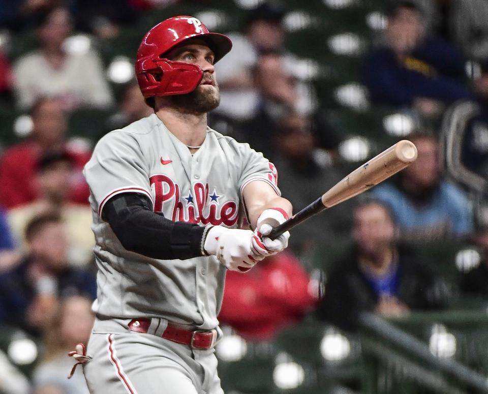 Bryce Harper watches a home run against the Brewers on June 8.