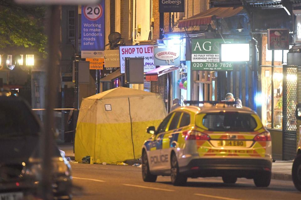The scene on Upper Street in Islington, north London, close to where a man was stabbed to death (PA)
