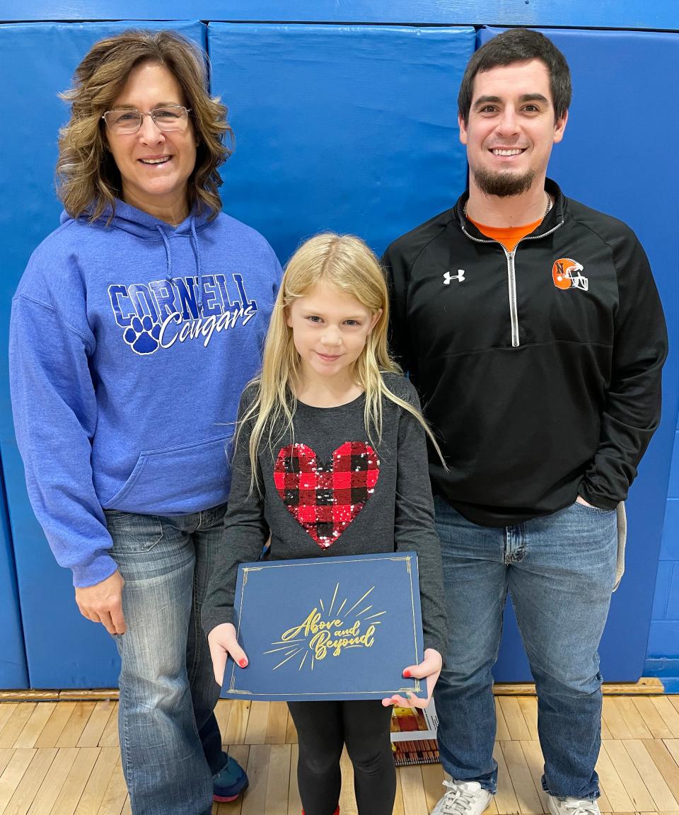 Brooklyn Lyons, center, was named Student of the Month for December at Cornell Grade School. Making the nomination were teachers Heidi Johnson, left, and Andrew Goodwin.