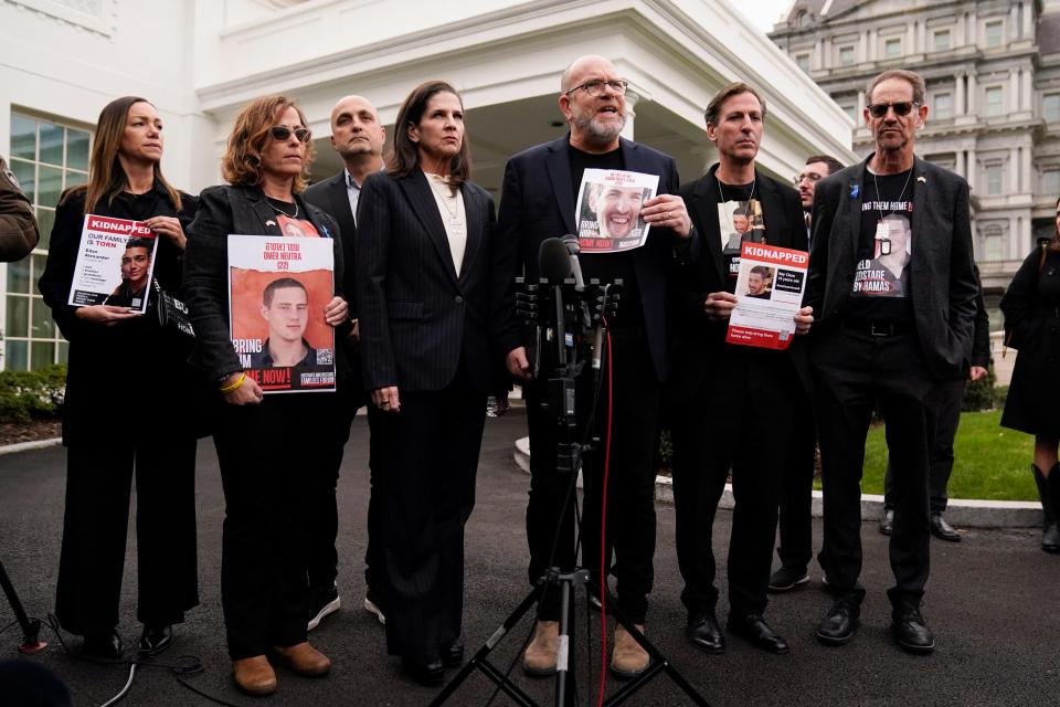 Ruby Chen, second from right, and family members of other U.S. citizens being held by Hamas in Gaza speak after meeting with President Joe Biden at the White House on Dec. 13, 2023.