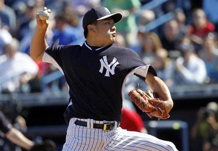 Mar 1, 2014; Tampa, FL, USA; New York Yankees starting pitcher Masahiro Tanaka (19) throws a pitch during the fifth inning against the Philadelphia Phillies at George M. Steinbrenner Field. Kim Klement-USA TODAY Sports