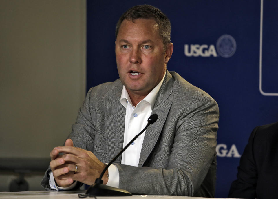 FILE - In this May 6, 2015, file photo , LPGA commissioner Mike Whan speaks during a press conference at The Players Championship golf tournament in Ponte Vedra Beach, Fla. Whan says the LPGA Tour made it through a pandemic year in solid financial shape. (AP Photo/Chris O'Meara, File)