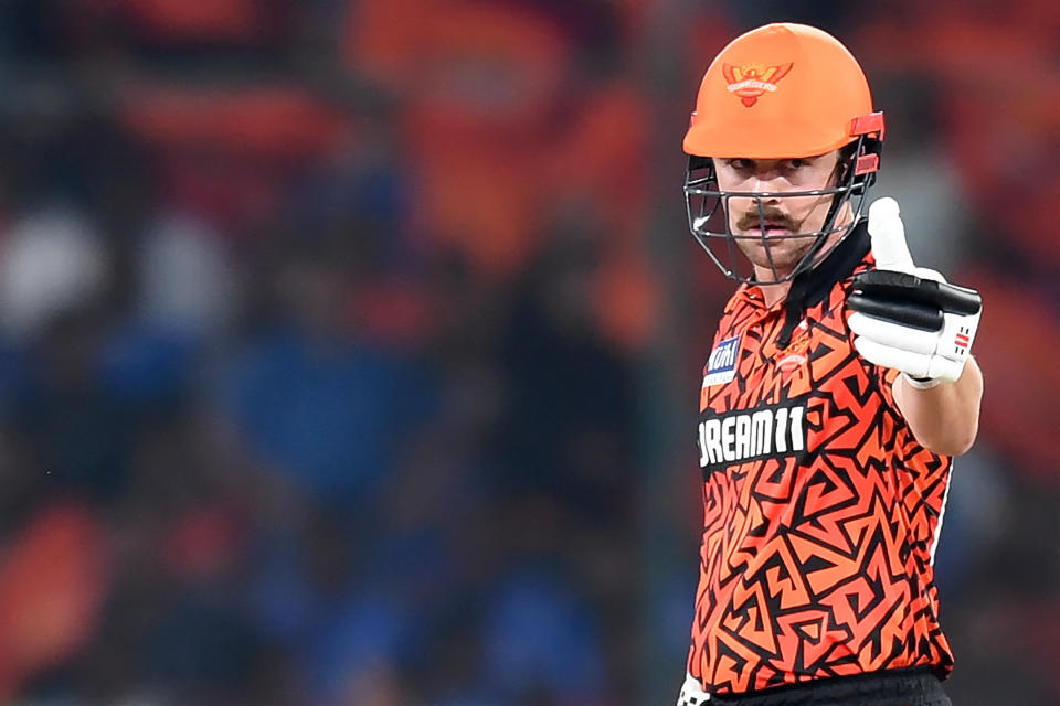 Sunrisers Hyderabad's Travis Head celebrates after scoring a half-century (50 runs) during the Indian Premier League (IPL) Twenty20 cricket match between Sunrisers Hyderabad and Mumbai Indians at the Rajiv Gandhi International Stadium in Hyderabad on March 27, 2024. (Photo by Noah SEELAM / AFP) / -- IMAGE RESTRICTED TO EDITORIAL USE - STRICTLY NO COMMERCIAL USE -- (Photo by NOAH SEELAM/AFP via Getty Images)