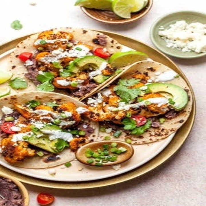 cauliflower tacos with various toppings