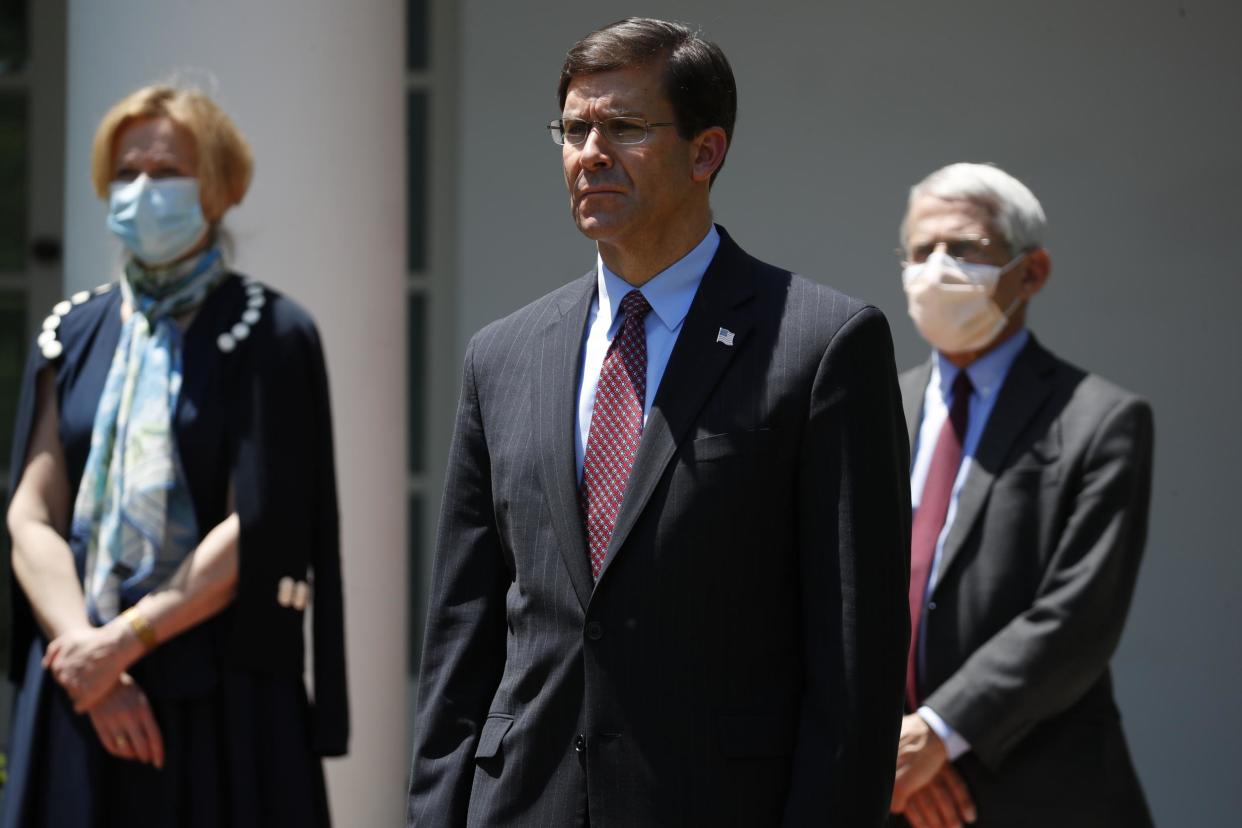 Defense Secretary Mark Esper pictured with White House coronavirus response coordinator Dr. Deborah Birx and Director of the National Institute of Allergy and Infectious Diseases Dr. Anthony Fauci: AP Photo/Alex Brandon