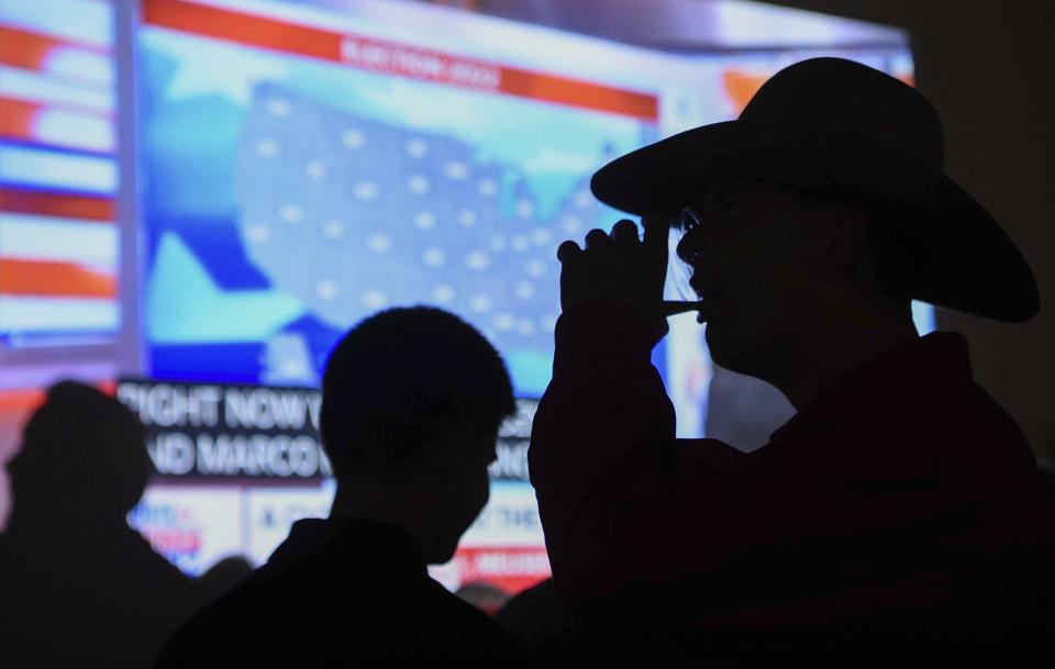 Supporters of Andy Ogles attend an election-night watch party in Columbia, Tenn., Tuesday, Nov. 8, 2022. Ogles, a Republican, is running in Tennessee's 5th Congressional District. (Stephanie Amador/The Tennessean via AP)