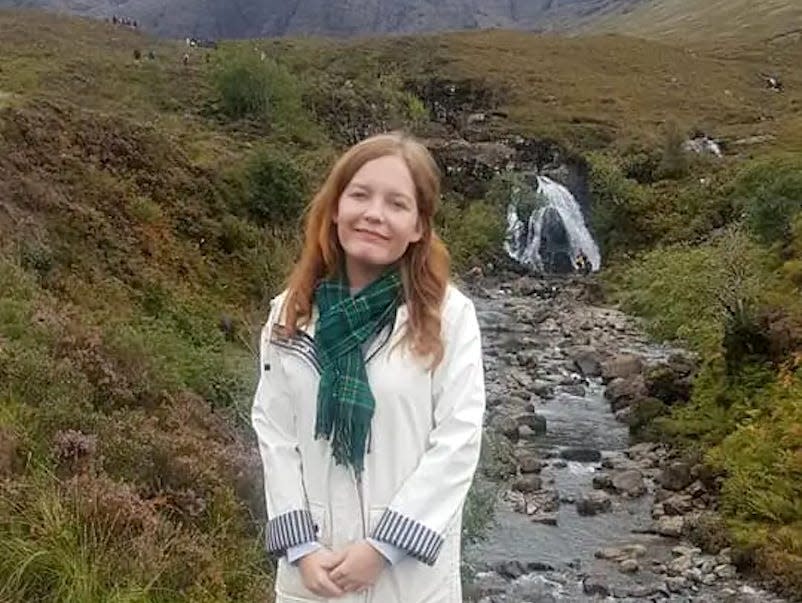 Mikhaila Friel wearing a raincoat during a visit to the Isle of Skye in the summer of 2018.