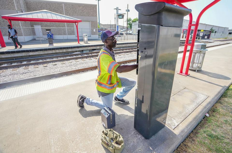 Contractor and field tech Freddie Adams works on one of the kiosks at the Kramer Station commuter rail stop. Kramer Station is to be replaced by the new Broadmoor Station off North MoPac Boulevard near the Domain.