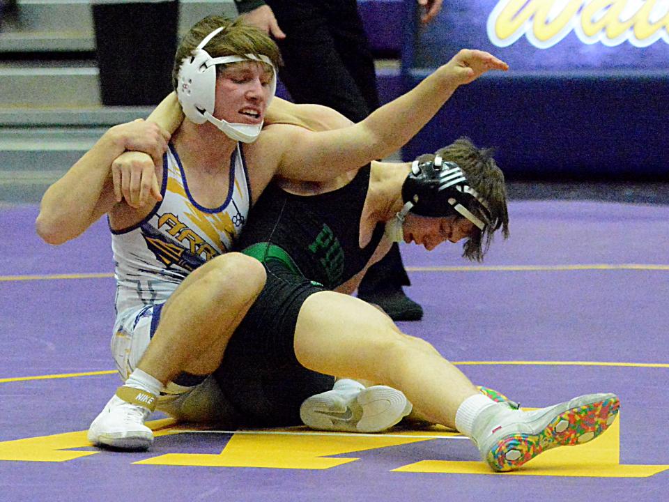 Watertown's Weston Everson and Pierre's Rowdy Menning fight for control during their 126-pound match in an Eastern South Dakota Conference wrestling dual on Thursday, Jan. 12, 2023 in the Civic Arena.