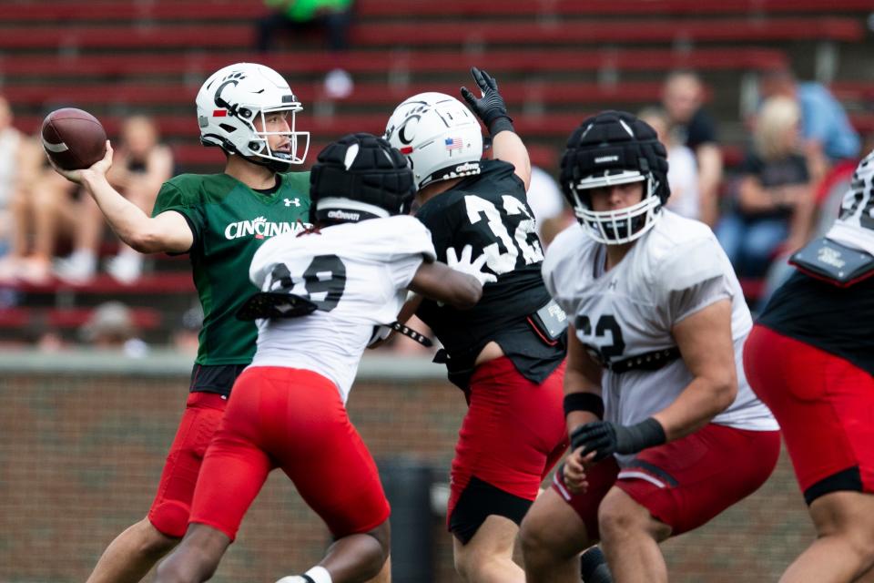 Cincinnati Bearcats quarterback Ben Bryant (6) makes a complete pass during the Cincinnati Bearcats spring scrimmage at Nippert Stadium on Saturday, April 15, 2023.