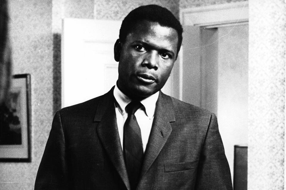 Sidney Poitier standing with his hands folded in a scene from the film 'In The Heat Of The Night', 1967.