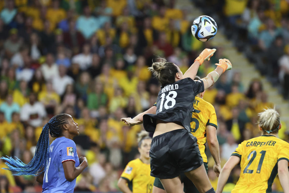 Australia's goalkeeper Mackenzie Arnold punches the ball away during the Women's World Cup quarterfinal soccer match between Australia and France in Brisbane, Australia, Saturday, Aug. 12, 2023. (AP Photo/Tertius Pickard)