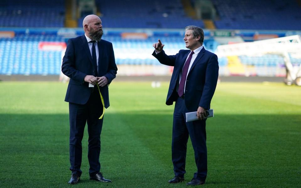  Sir Keir Starmer is given a tour of the ground by John Mallalieu, Chief Executive of the Leeds United Foundation - Getty