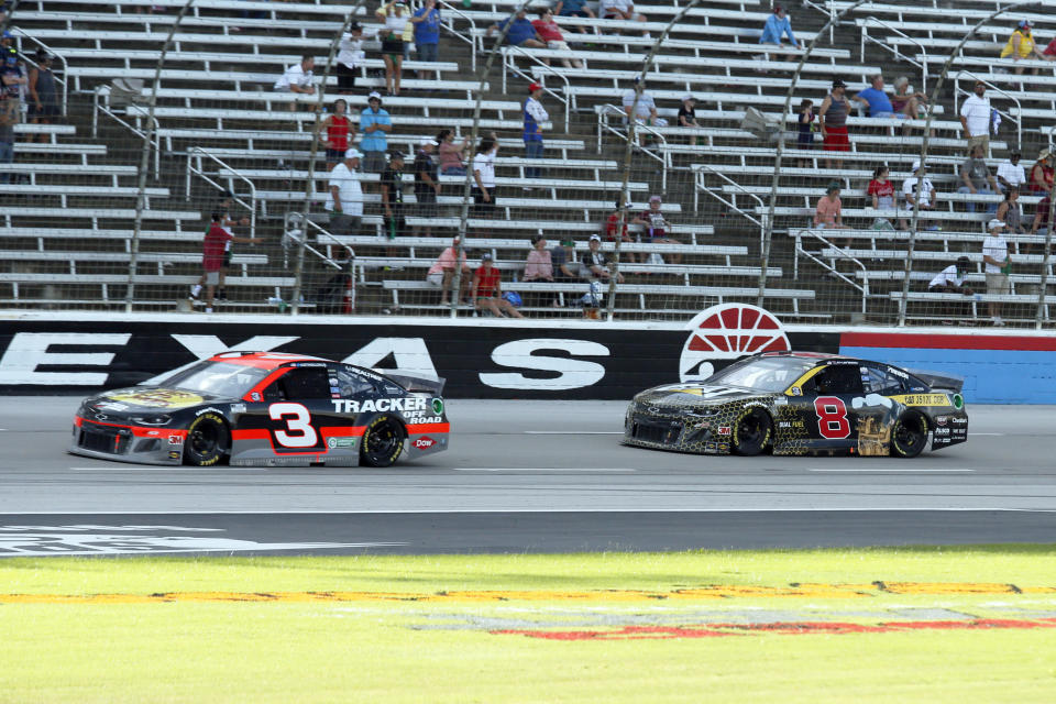 Austin Dillon (3) and Tyler Reddick (8) head down the front stretch during a NASCAR Cup Series auto race at Texas Motor Speedway in Fort Worth, Texas, Sunday, July 19, 2020. (AP Photo/Ray Carlin)