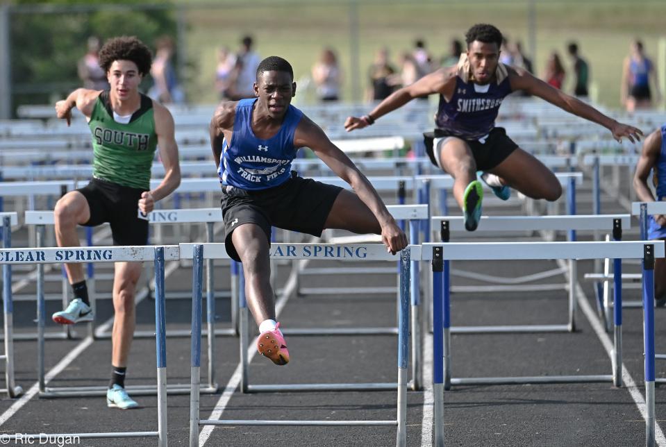 Williamsport's Richard Sanon, center, won the boys 110 hurdles.