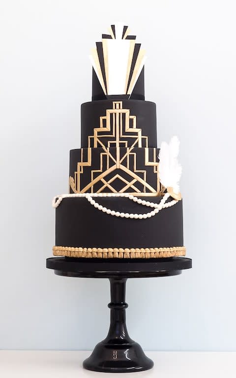 Four tier black and gold Art Deco cake by Rosalind Miller - Credit: Rosalind Miller/Rosalind Miller