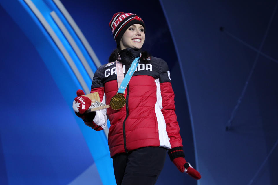 <p>In PyeongChang, their routine earned them their second gold medal as they helped propel Canada to the top of the podium in the figure skating team event. (Getty) </p>