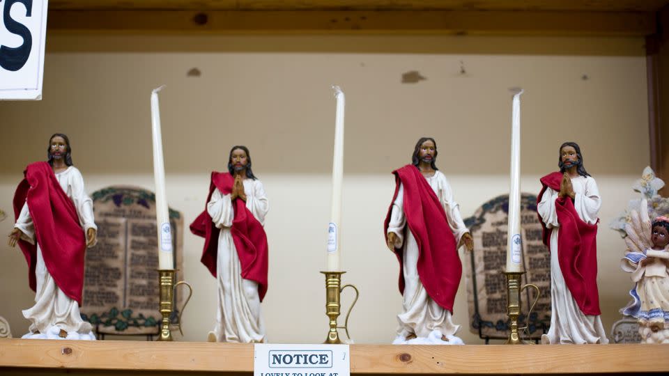 Statues of a black Jesus are displayed in the Africa shop at the South of the Border complex on July 21, 2006, in Dillon, South Carolina. - Jeff Hutchens/Getty Images